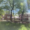 The New Carriage House at 311 South Happy Hollow Boulevard